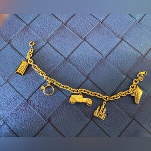 Avon Vintage “Have it All” Charm Bracelet